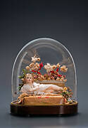 Fanal with Christ Child reclined, with halo and river pearls